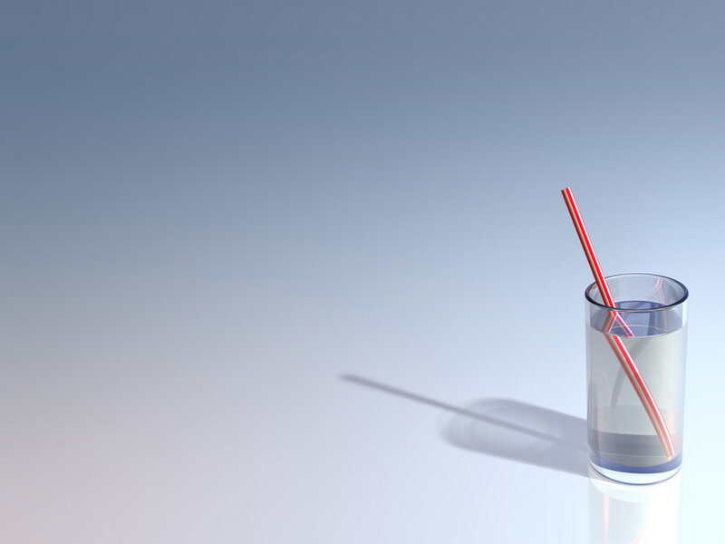glass of water with straw
