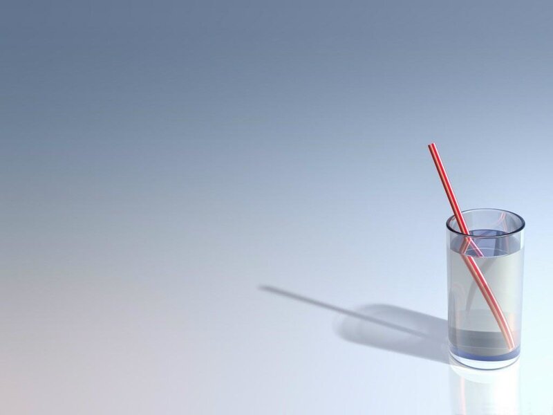 glass of water with straw