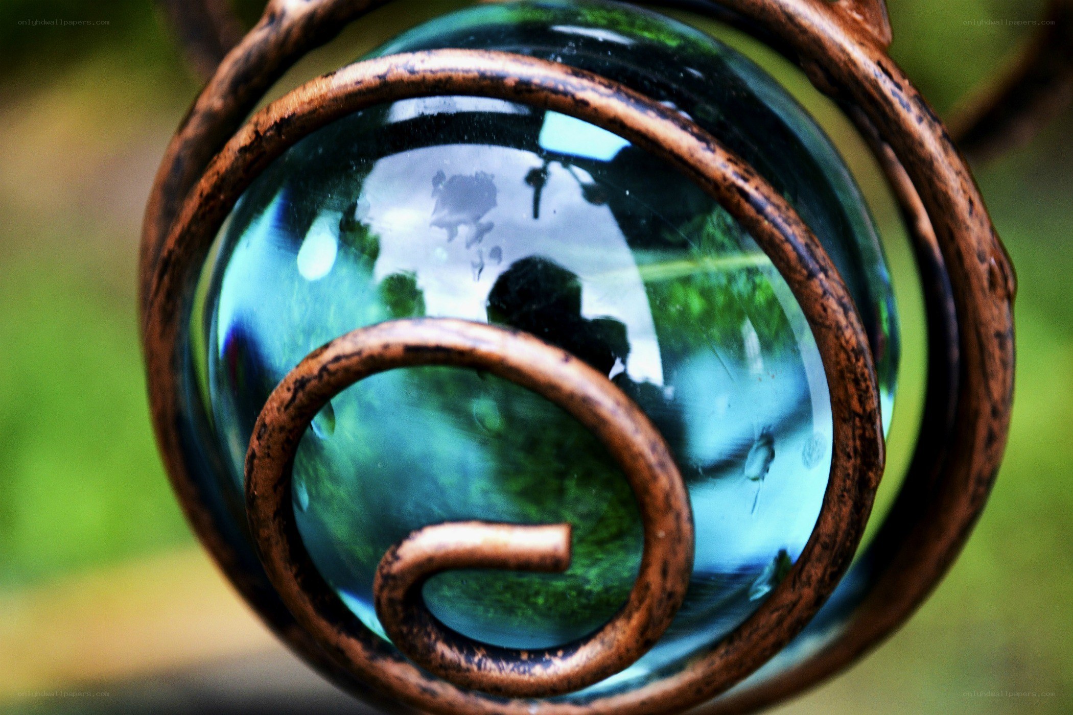 glass orb with metal frame