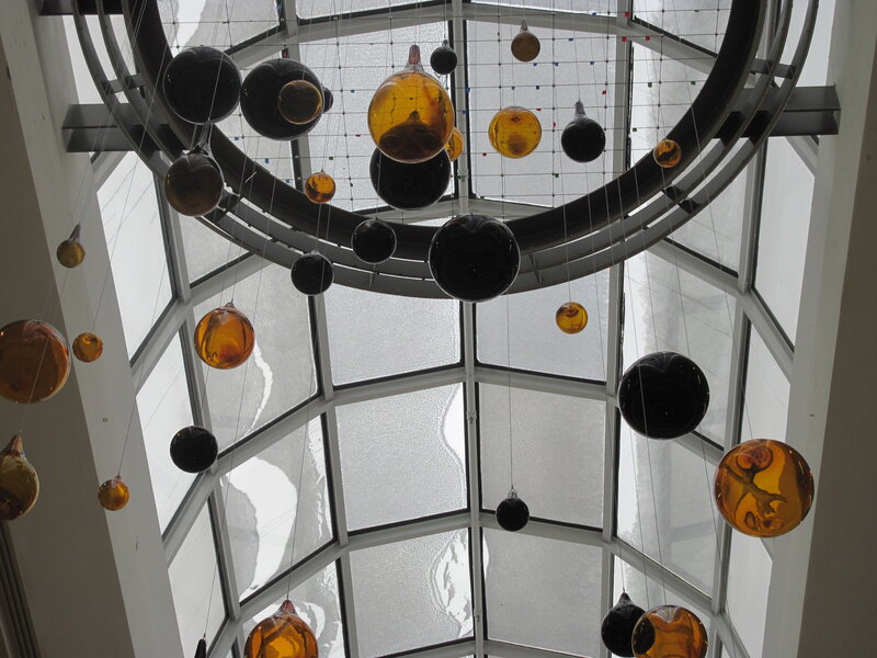 Glass Orbs Hanging from Ceiling