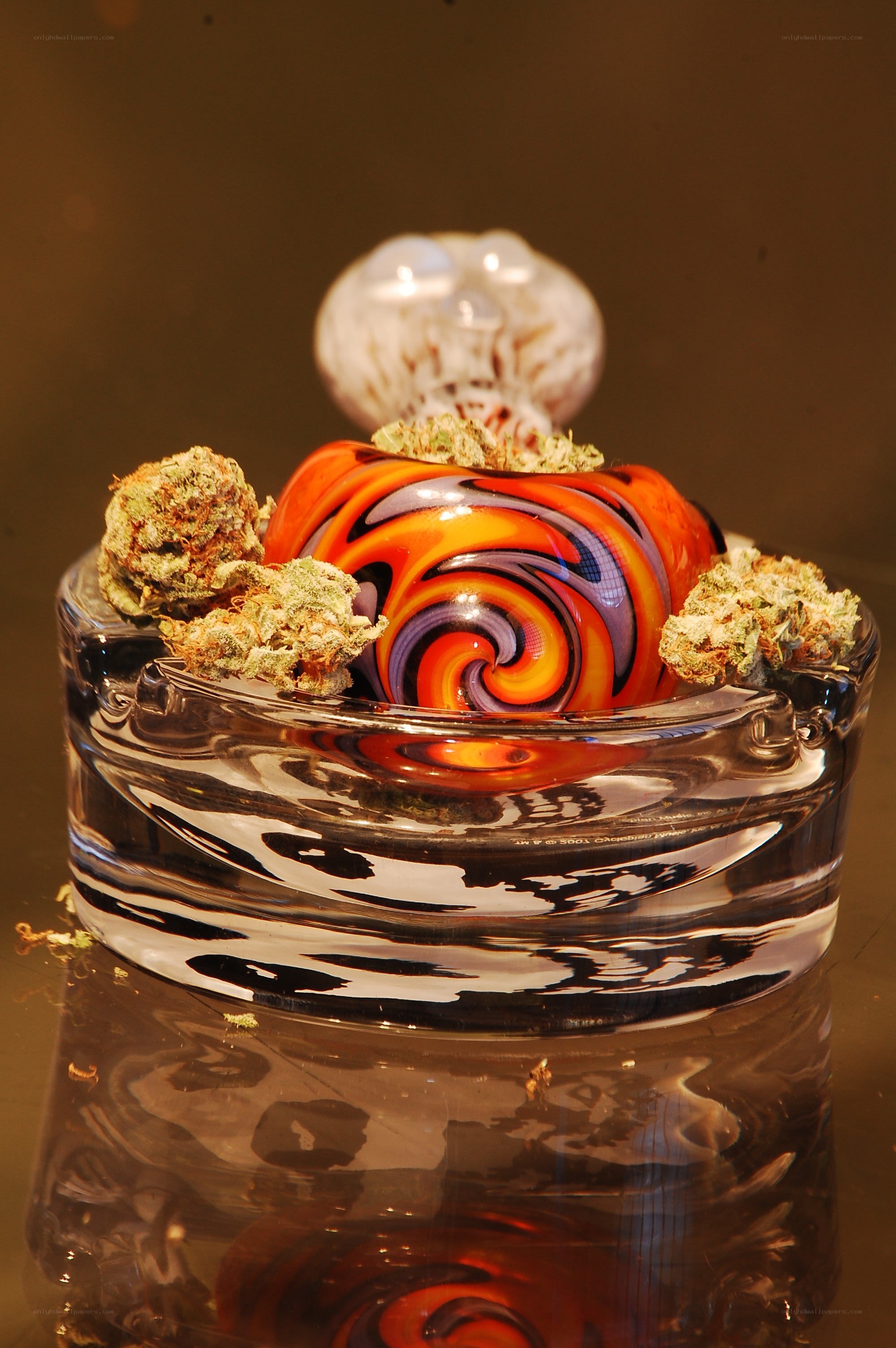Glass pipe with cannabis buds