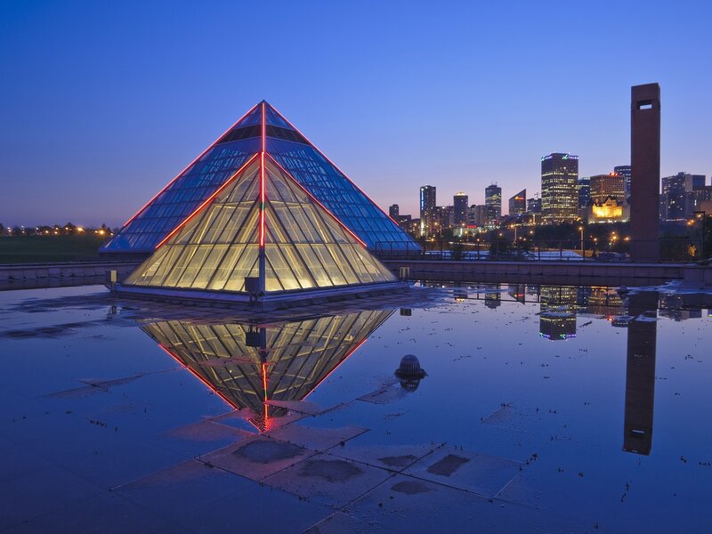 Glass Pyramid Structure — Blue, Serene, Night