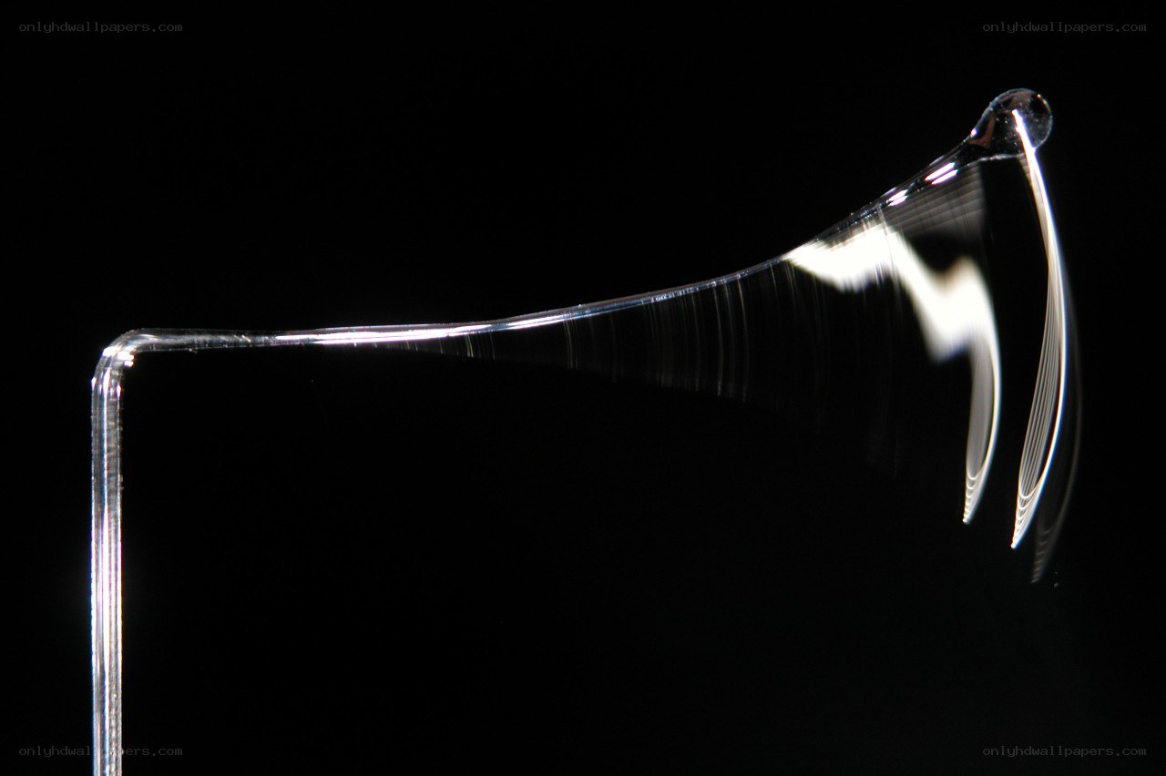Glass rod bending under stress
