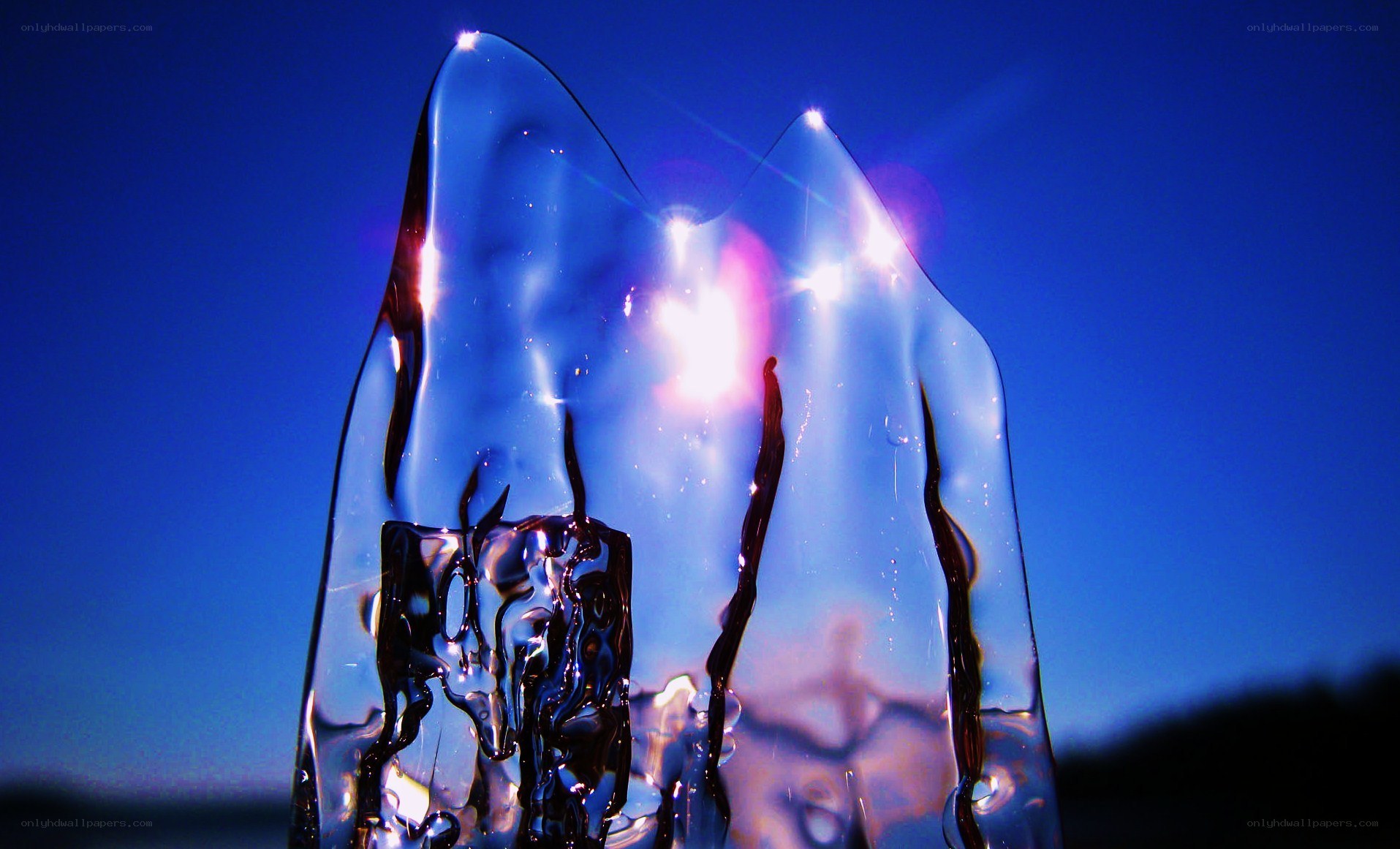 glass sculpture with light reflections