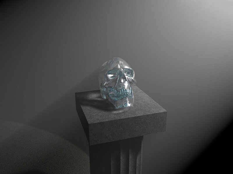glass skull on pedestal