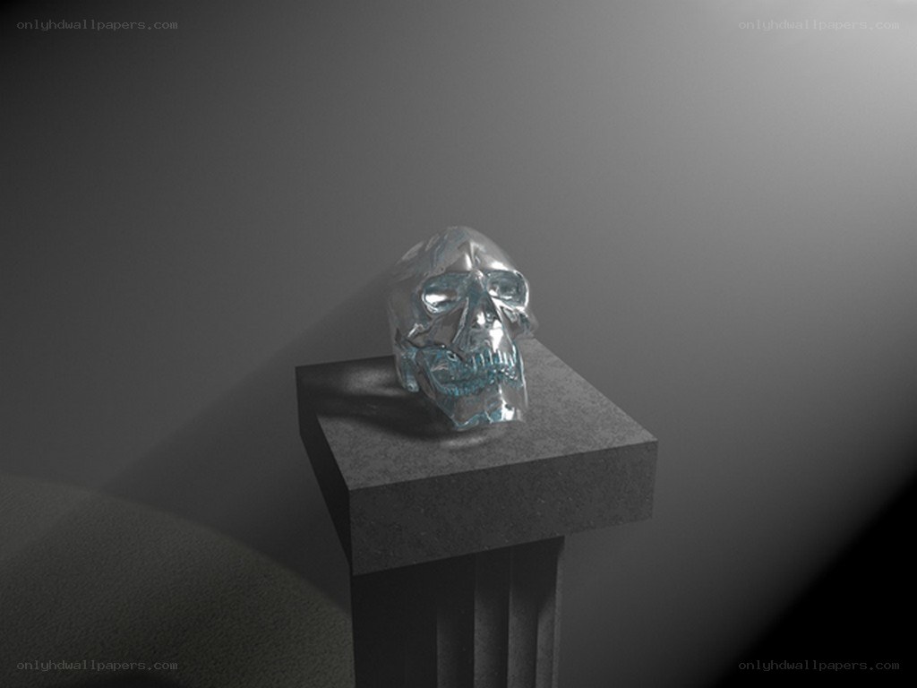 glass skull on pedestal