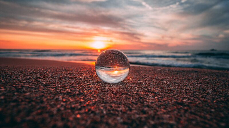 Glass Sphere on Beach — Orange