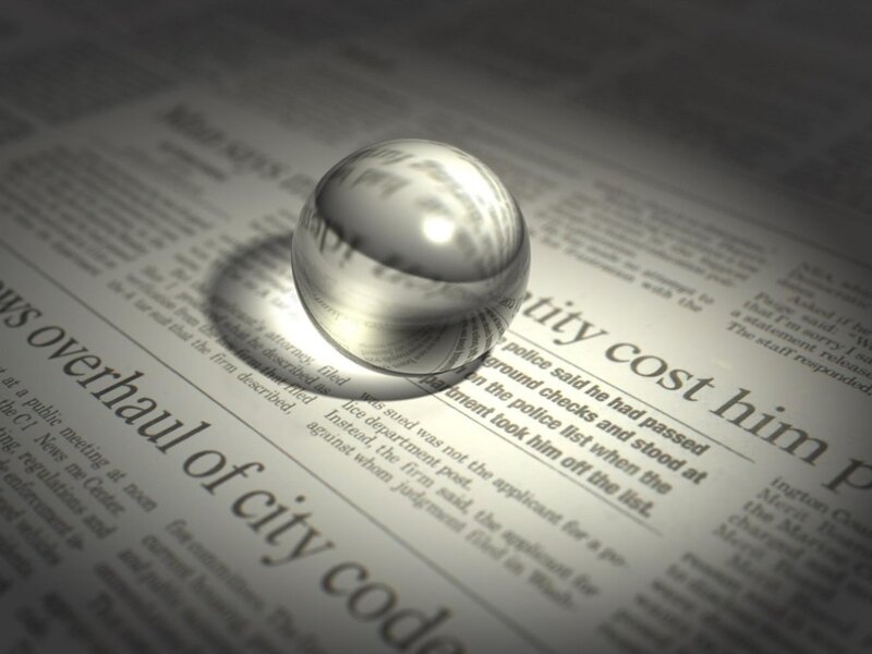 Glass Sphere on Newspaper — White, Dramatic
