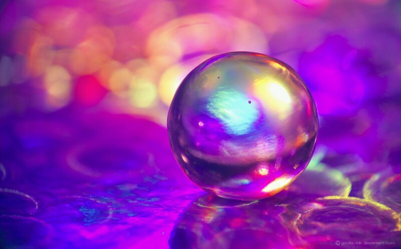 Glass Sphere on Purple Surface
