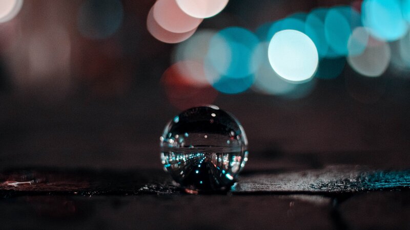 Glass Sphere on Wet Surface