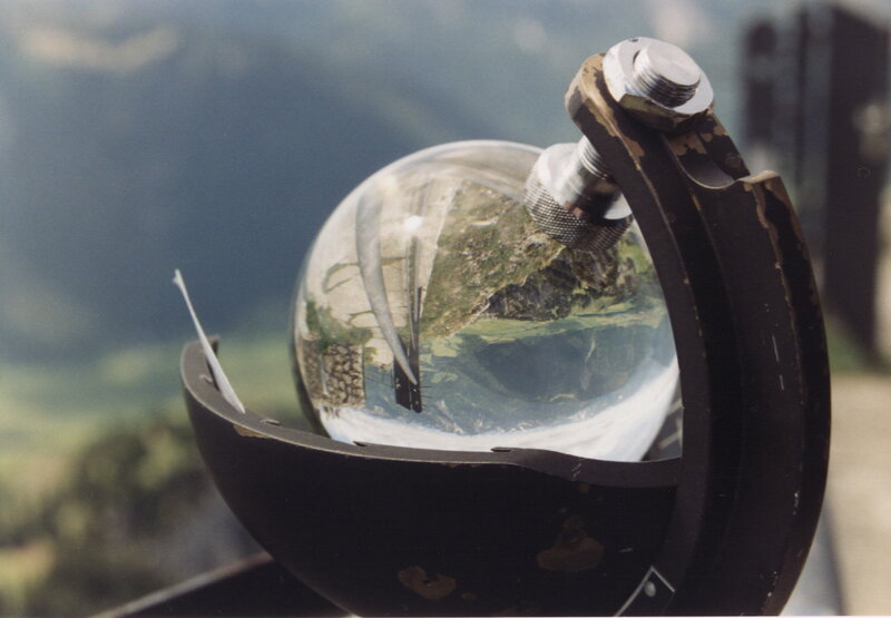 Glass sphere with landscape reflection