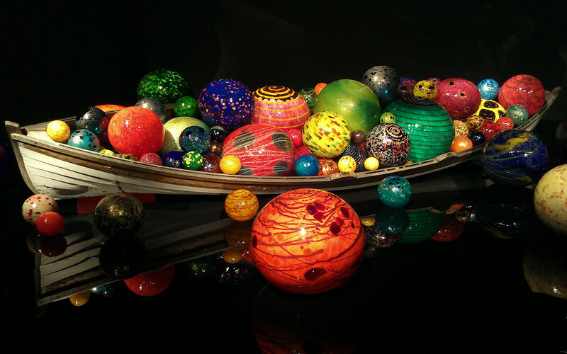 Glass Spheres in a Boat