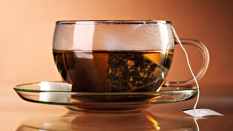Glass Teacup with Tea — Brown, Calm