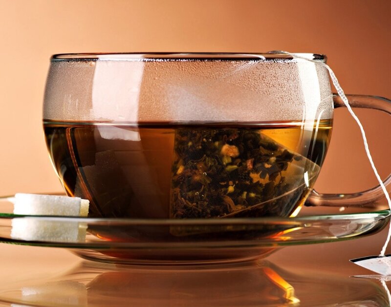 Glass Teacup with Tea — Brown
