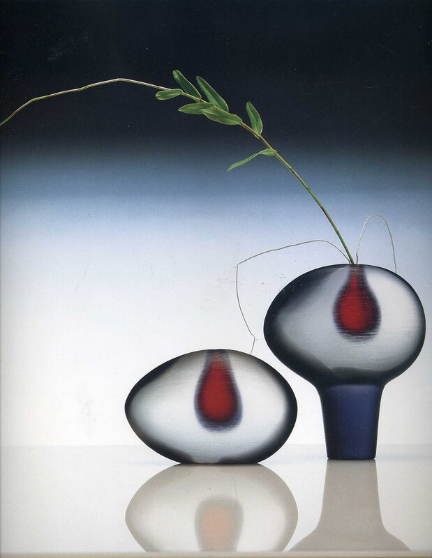 Glass vases with red drops