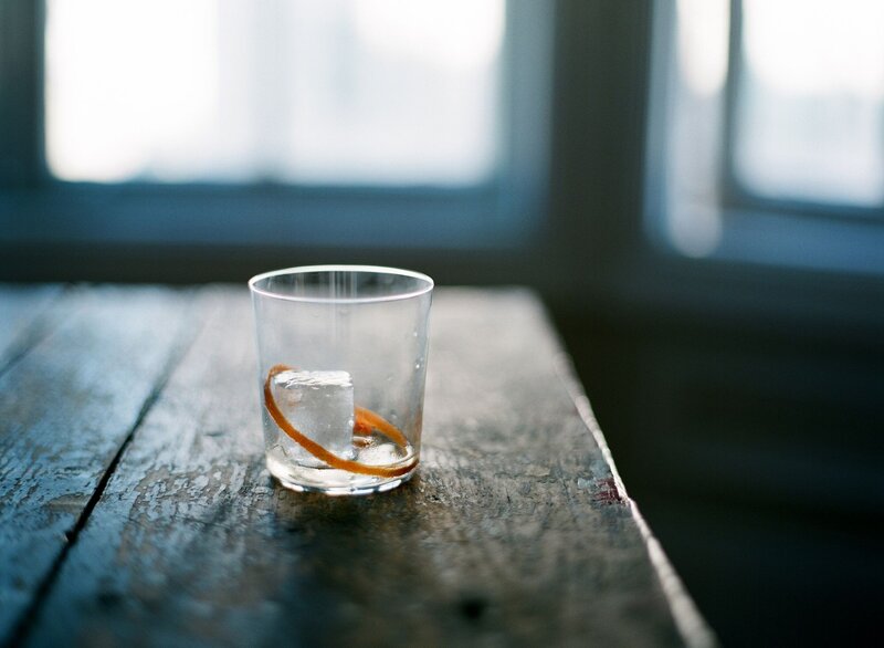 Glass with ice and orange peel