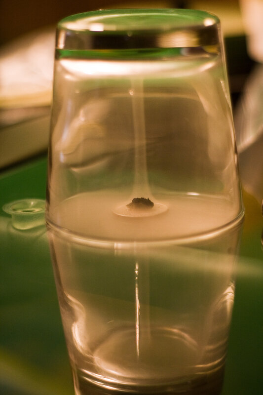 glass with smoke inside