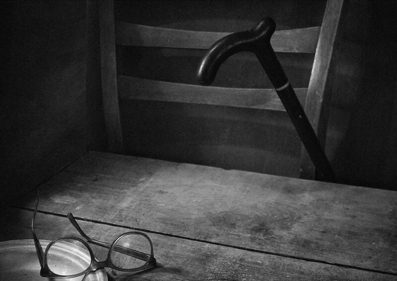 Glasses and Cane on Table