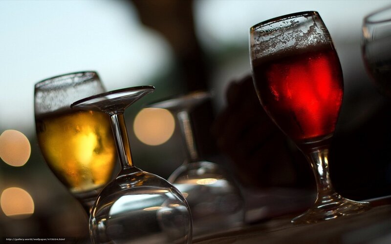 Glasses of beer on a table