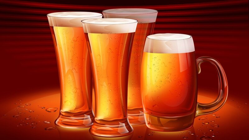 glasses of beer on red background