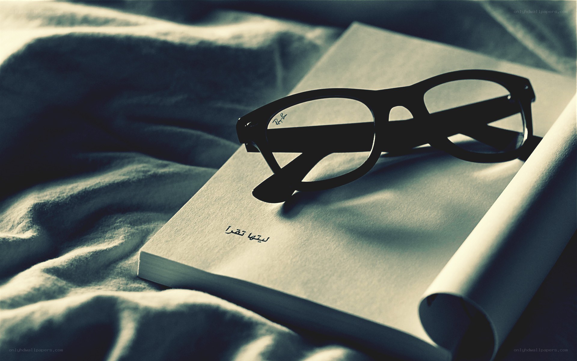 glasses on a book