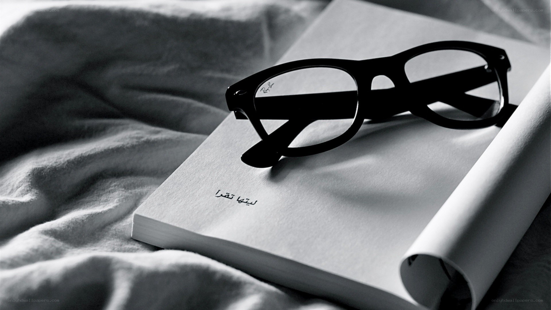 glasses on a book