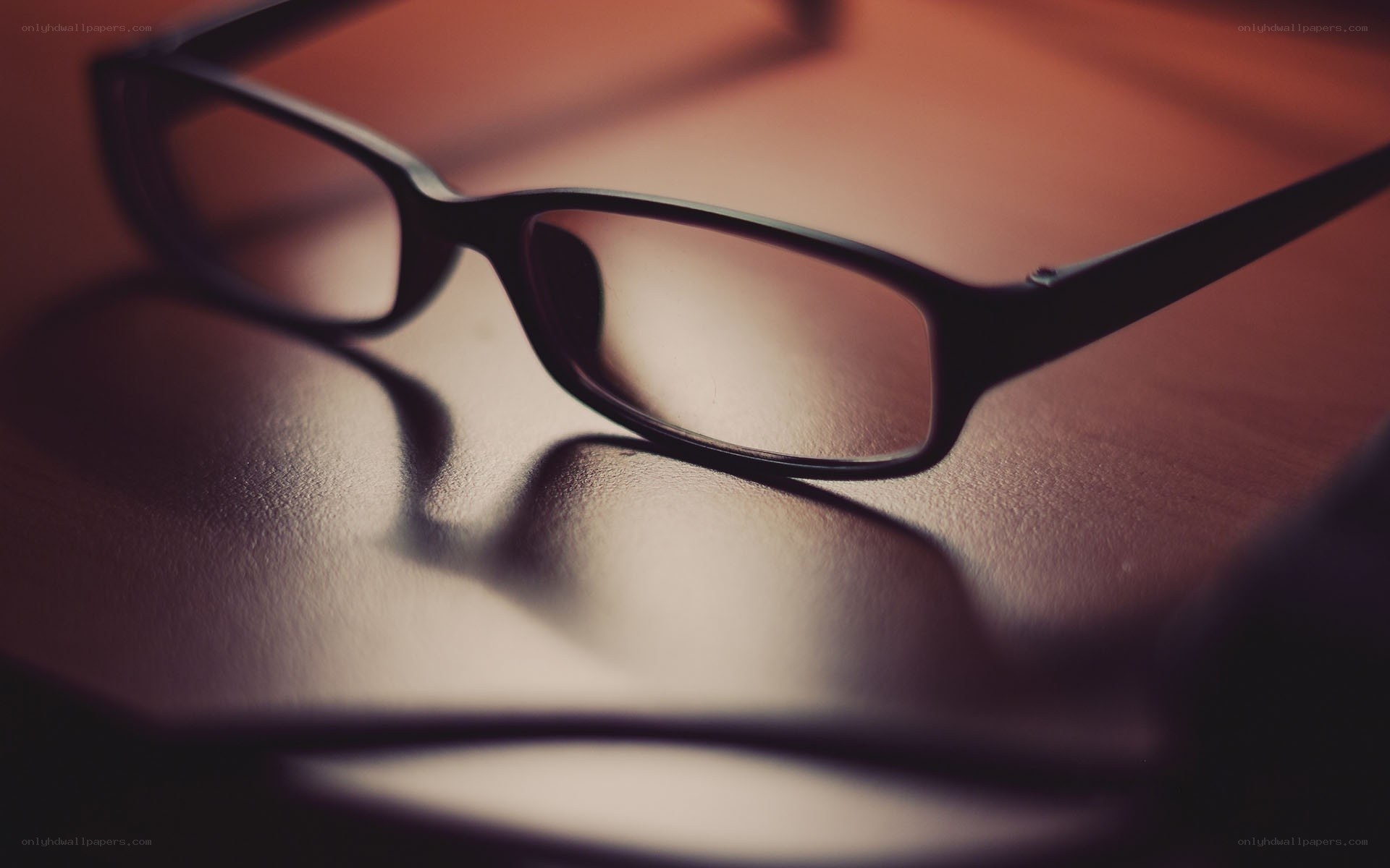 glasses on a wooden surface