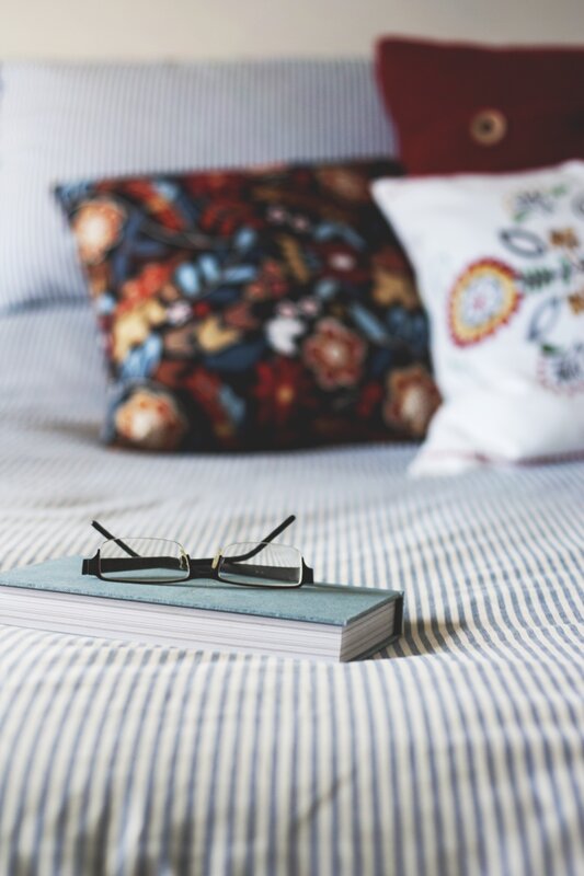 Glasses on Book — Blue