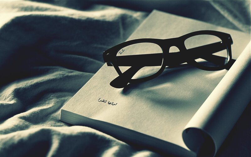 Glasses on Book — Gray