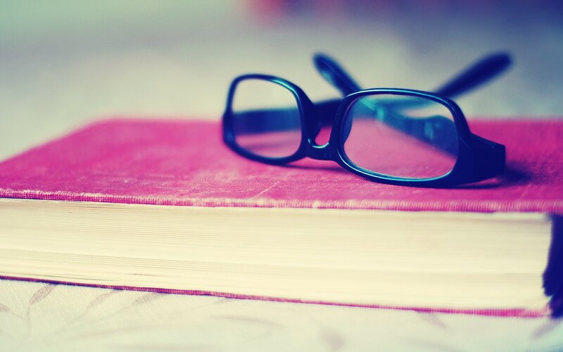 Glasses on Book — Pink, Calm, Photograph