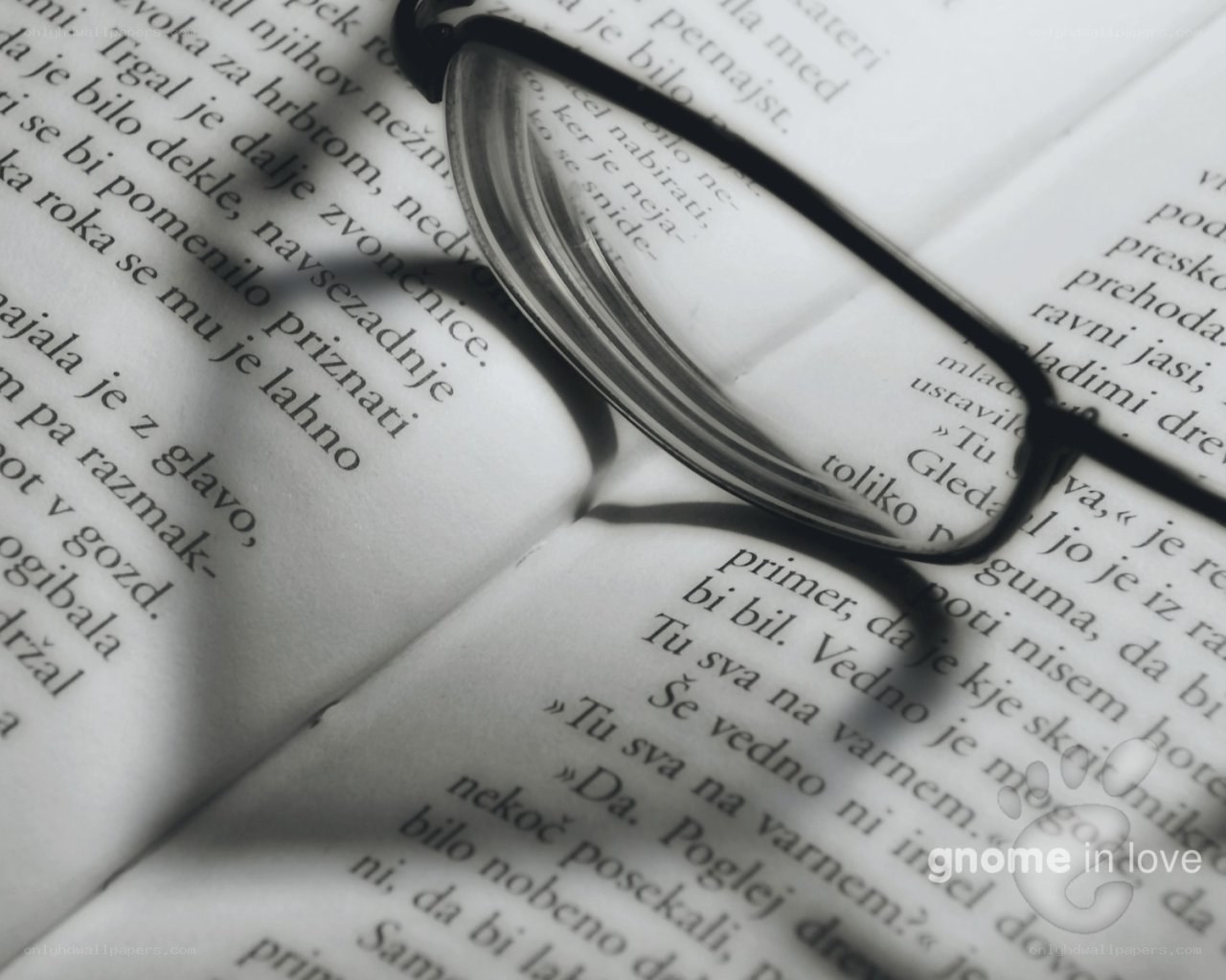 glasses on open book