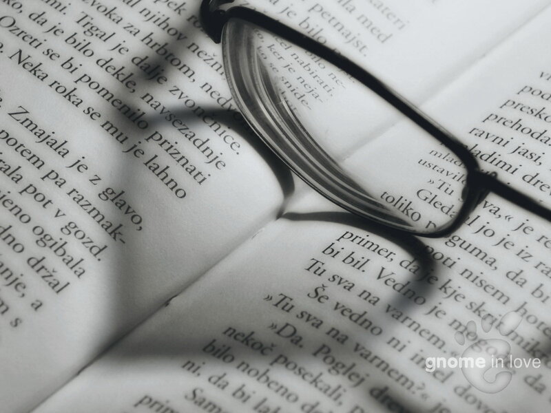 glasses on open book