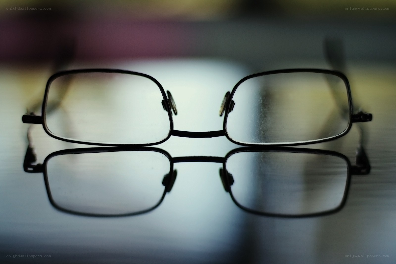 glasses on reflective surface