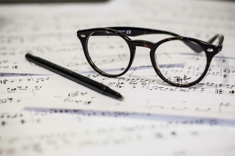 glasses on sheet music