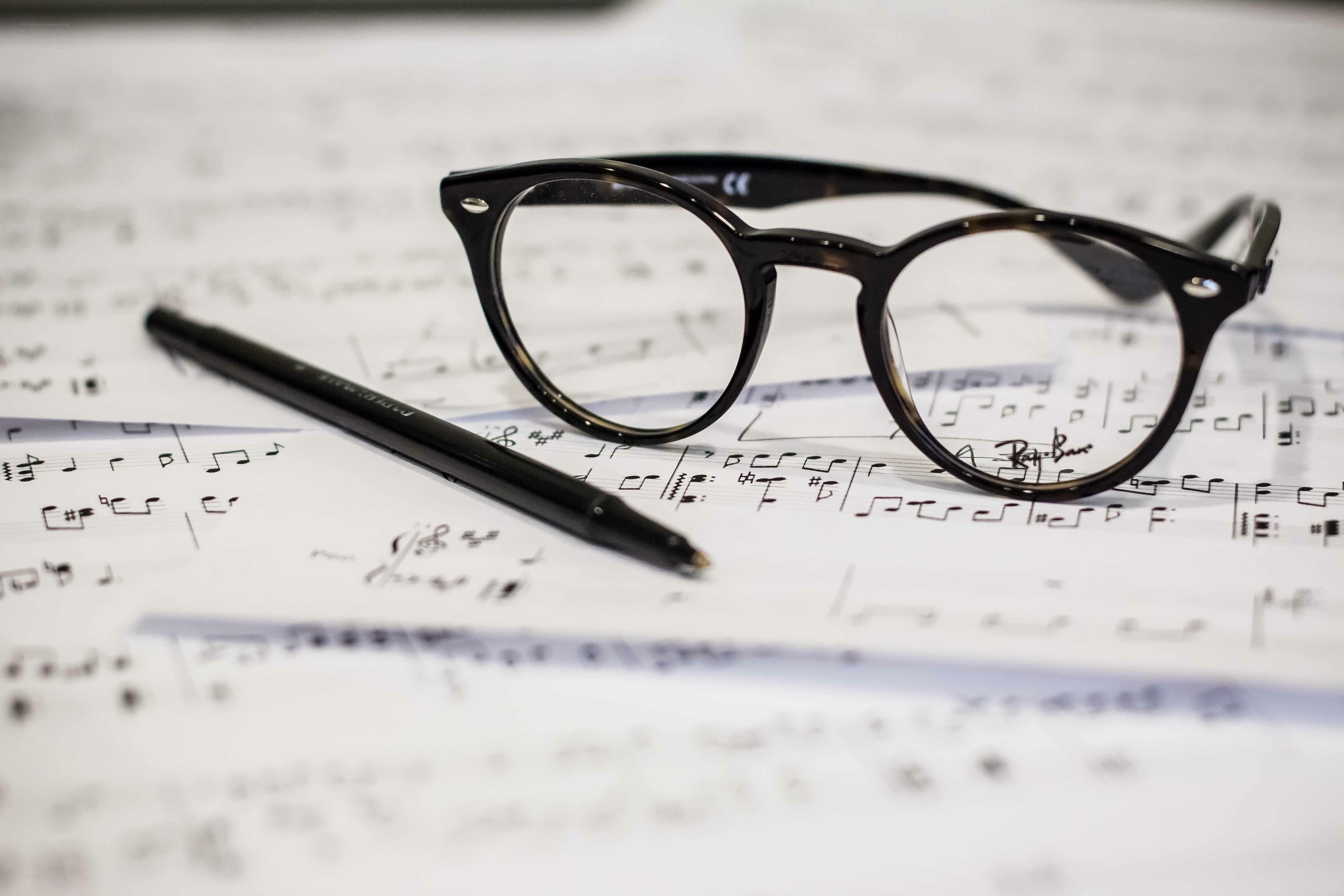 glasses on sheet music