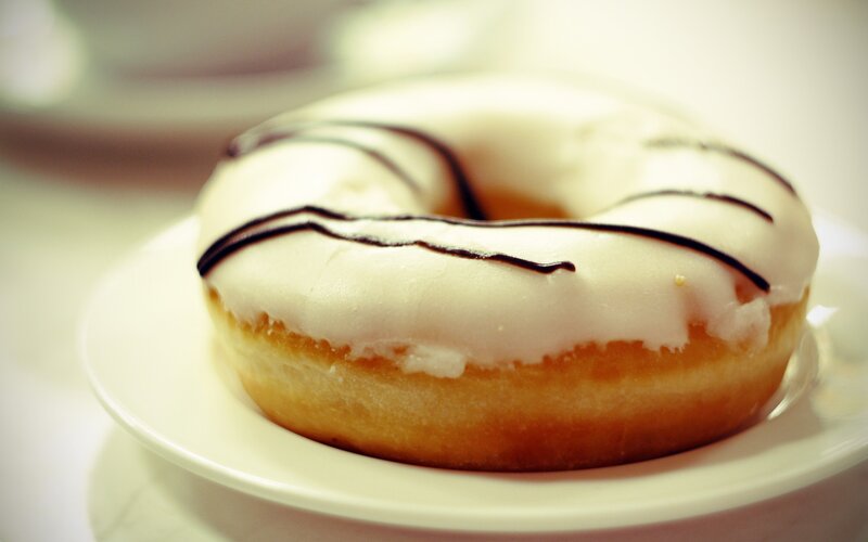 glazed donut with chocolate drizzle