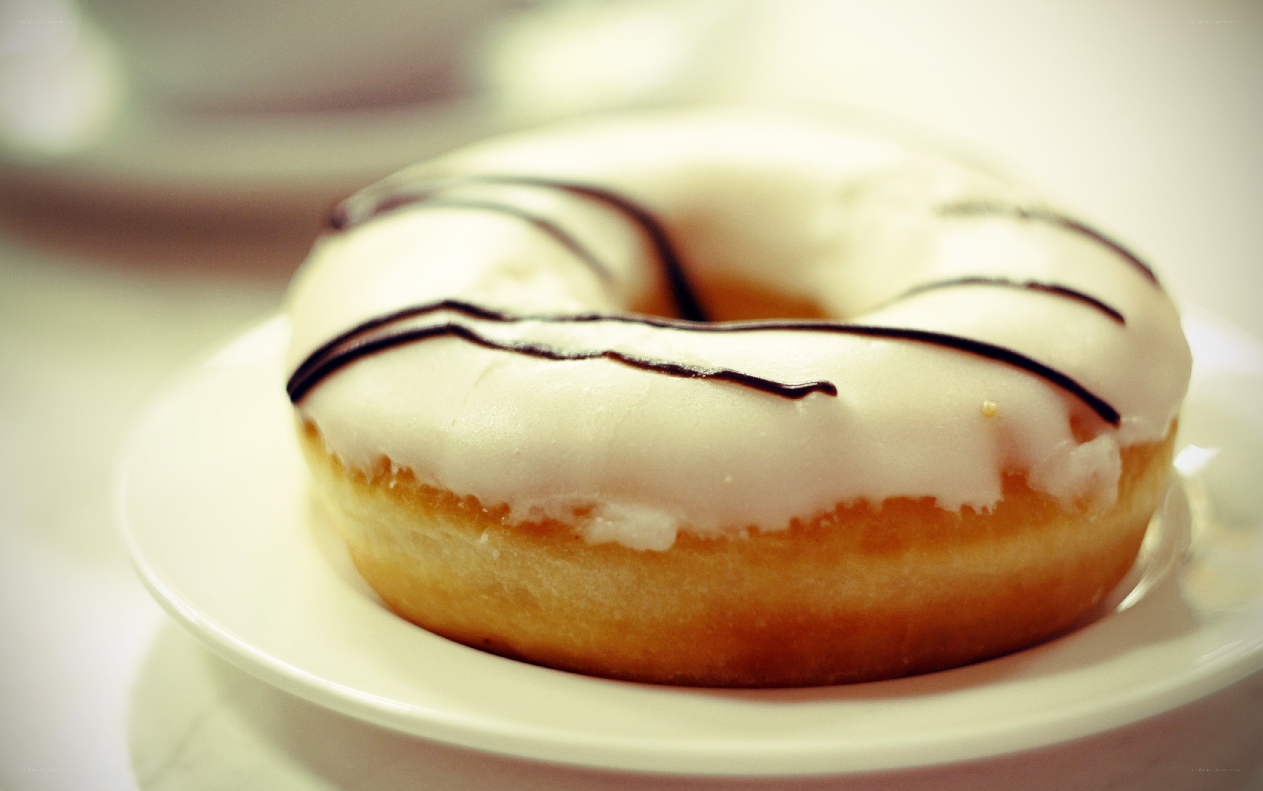 glazed donut with chocolate drizzle