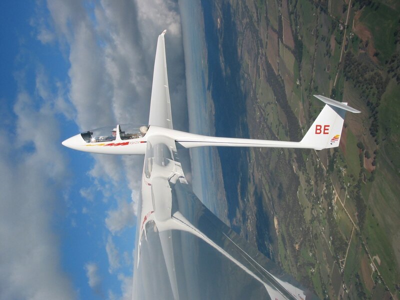 Glider Aircraft in Flight — White
