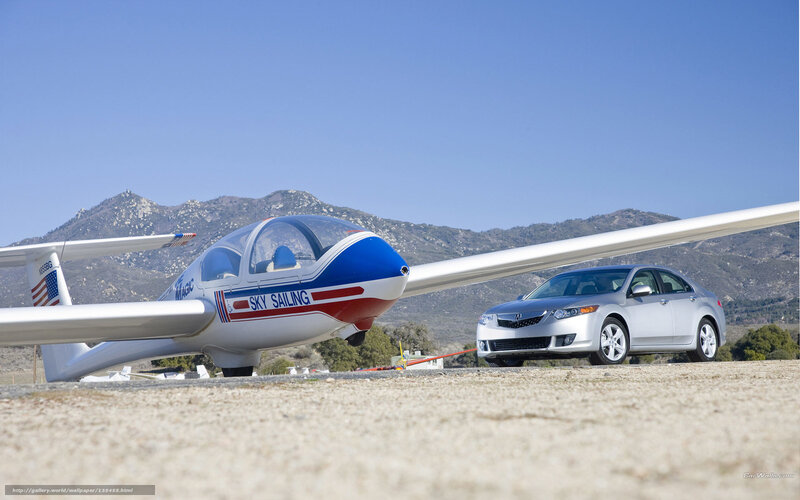 Glider and car on airfield