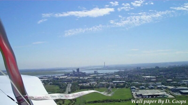 Glider Flying over City