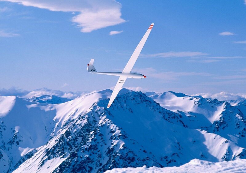Glider Flying over Mountains — Blue, Serene