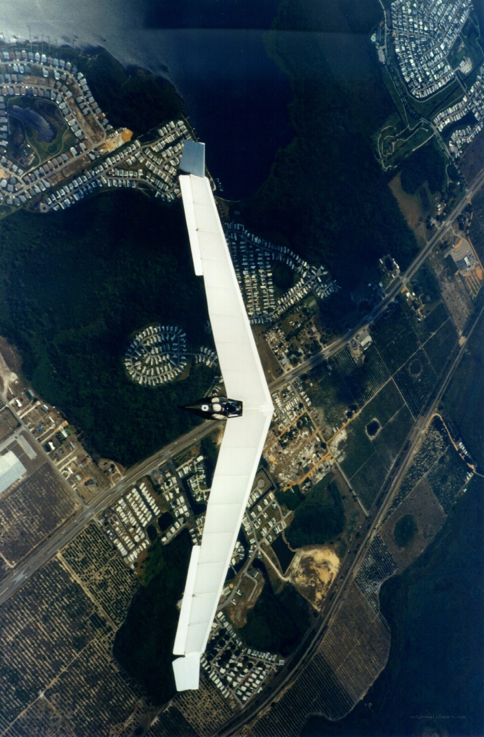 glider over suburban area