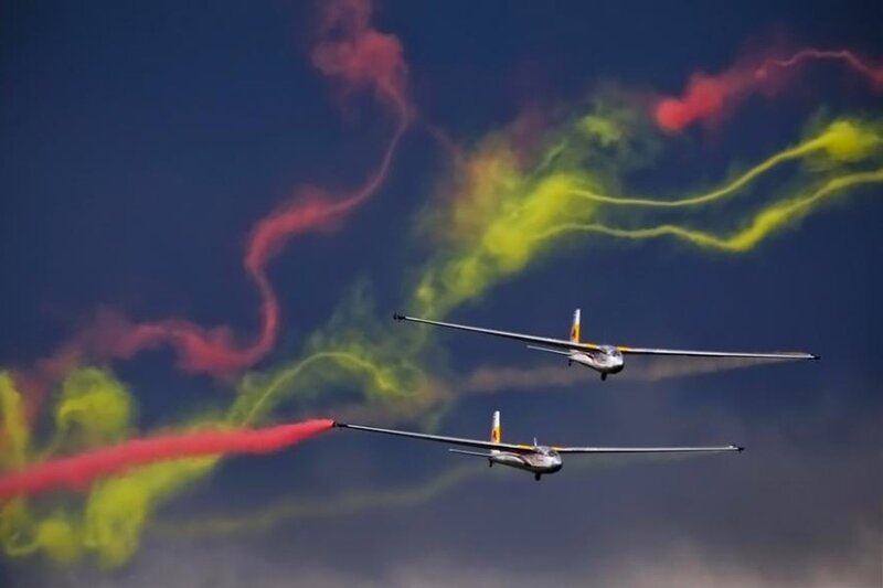 Glider planes with smoke trails