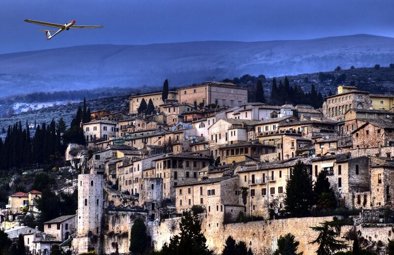 Gliding over a historic Italian town
