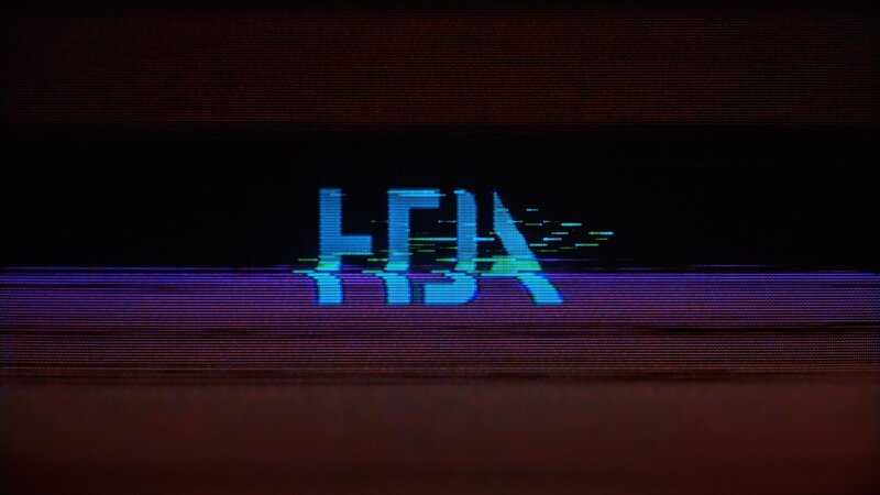 Glitching Text on Screen — Blue, Dark