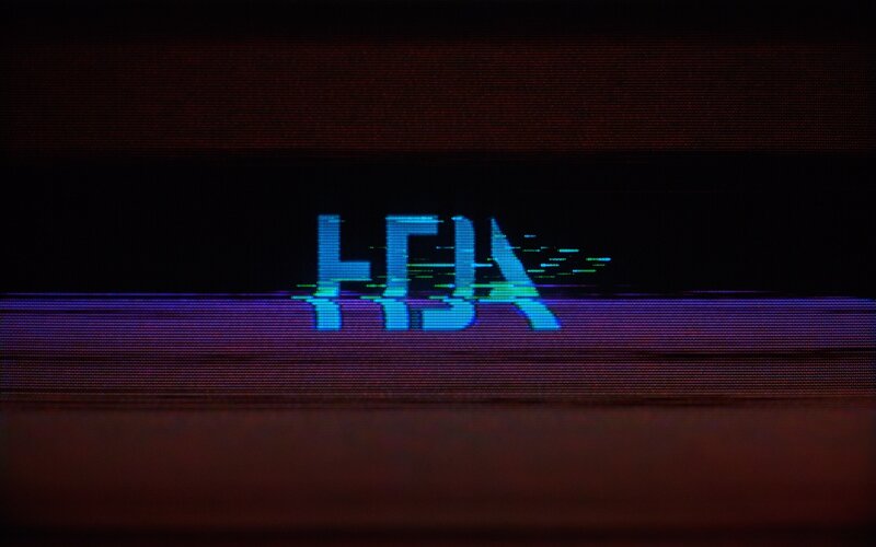 Glitching Text on Screen — Blue
