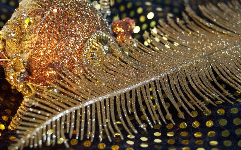 glittery golden feather decoration