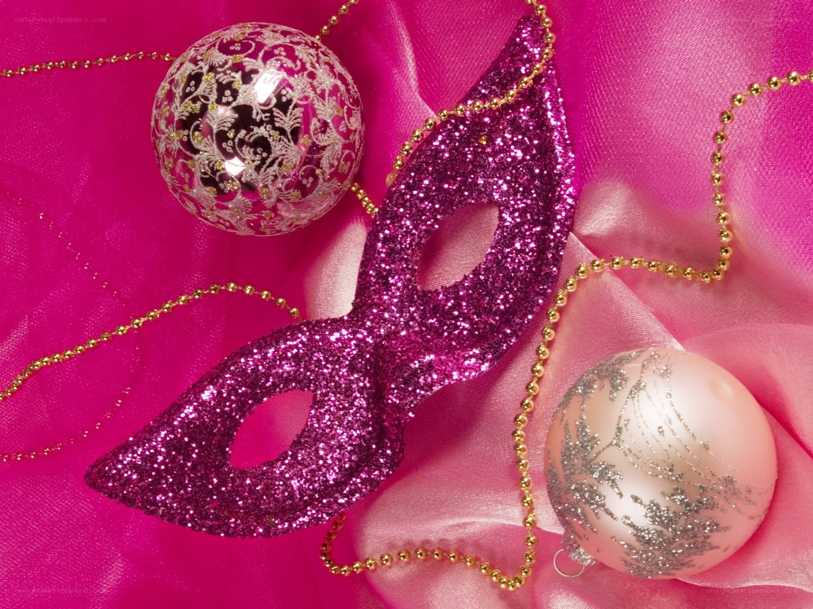 glittery masquerade mask and ornaments