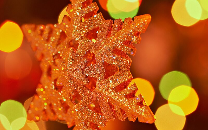 glittery orange snowflake ornament