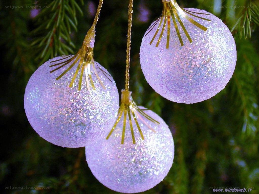 glittery purple ornaments on tree